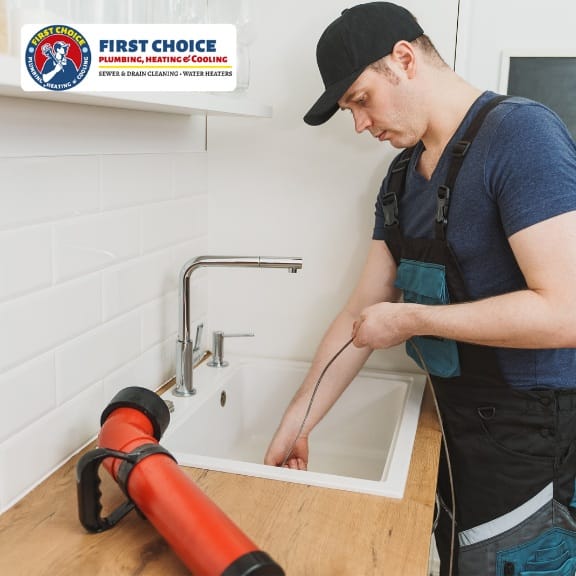 Snaking a Drain When to DIY & When to Call a Pro